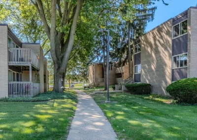 river drive apartment community building walkway