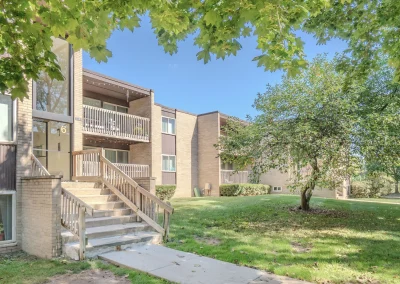 river drive apartment community building side view through trees riverdrive_4_v2